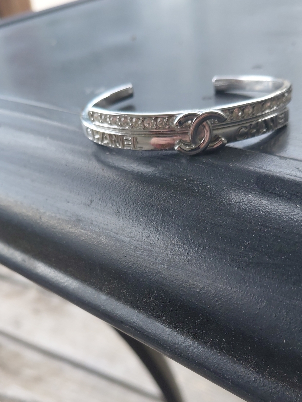 CHANEL Silver Crystal Row Logo Cuff Bracelet